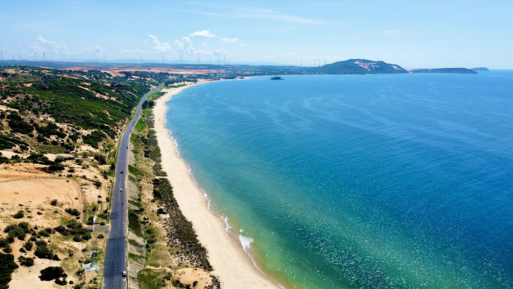 The coastal road from Phan Thiet to Mui Ne offers a relaxing ride with sea views, dunes, and vibrant local life